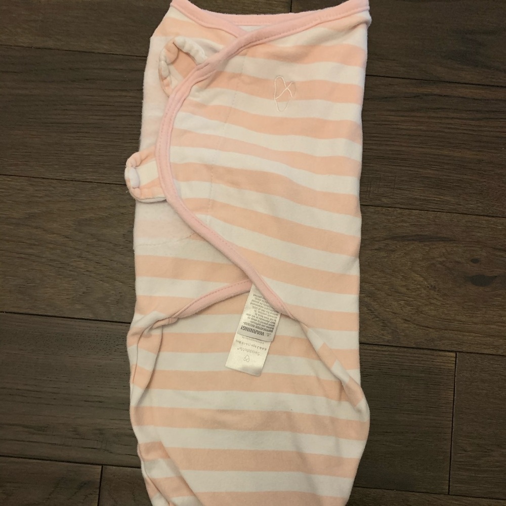 Swaddle me medium. 14-18 pounds.